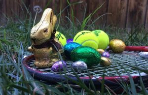 easter eggs and tennis racket